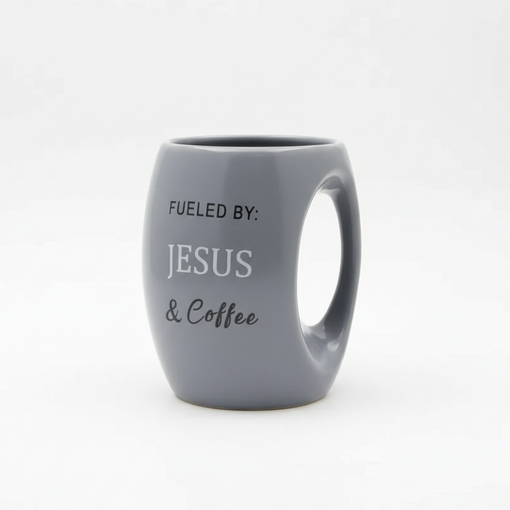 Gray mug with 'Fueled by: Jesus & Coffee' text on a white background