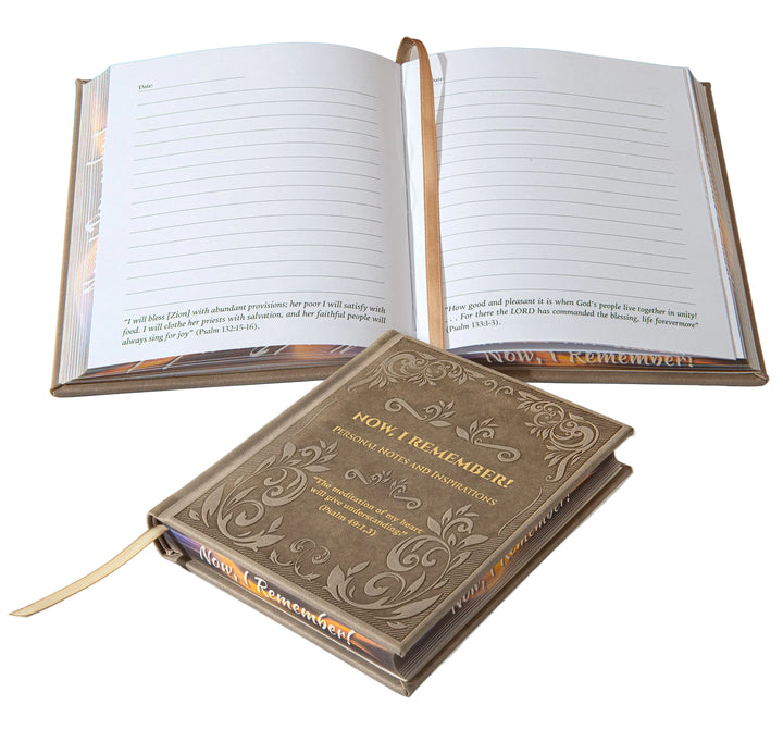 Open notebook with lined pages and decorative cover on a white background