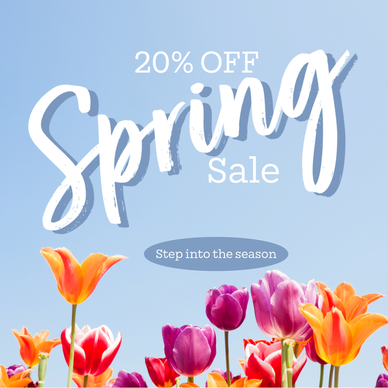 Spring sale advertisement with tulips on a blue background